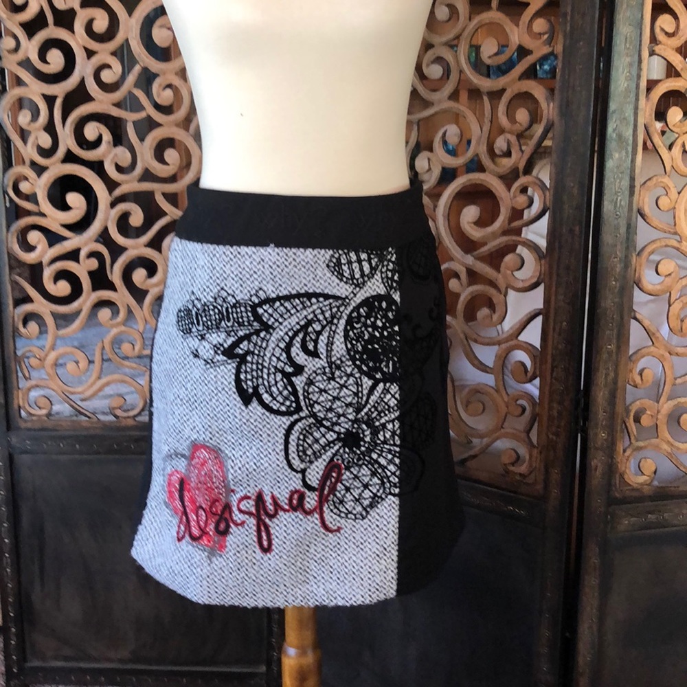 Multi patterned mini skirt by Desigual.
